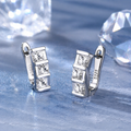 Moissanite Sterling Silver 3-Stone Clear CZ Huggie Earrings - White